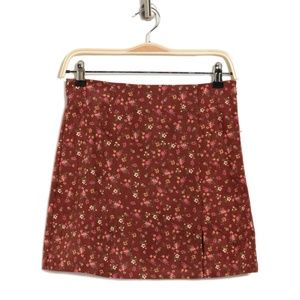 ELODIE Floral Print Corduroy Mini Skirt In Rust Floral